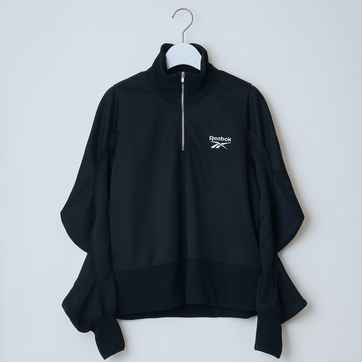 Reebok half zip deformed sweat shirt