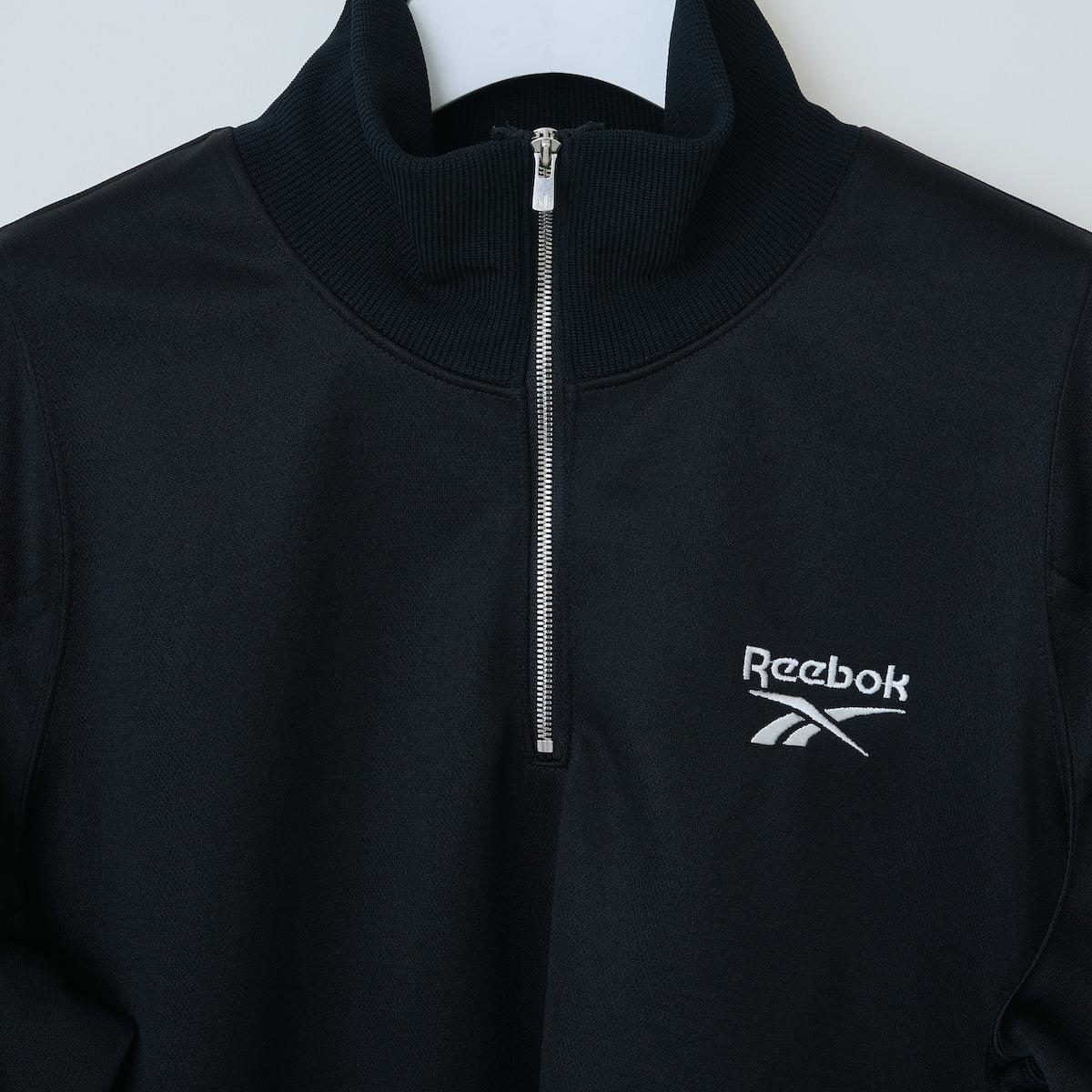 Reebok half zip deformed sweat shirt