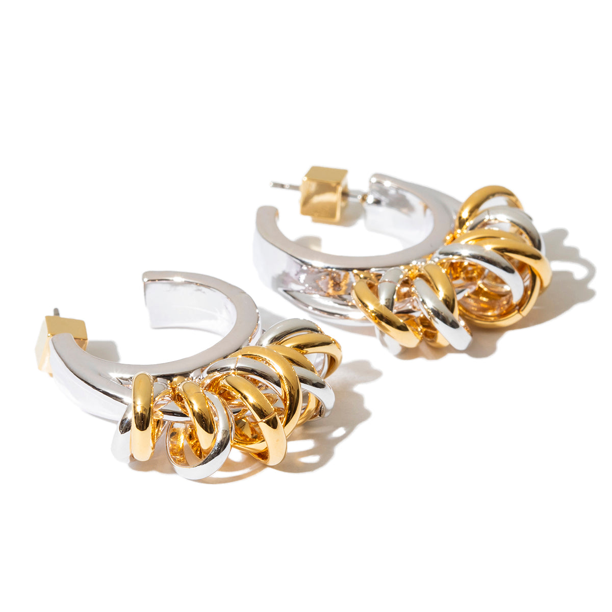 Volume coil pierced earrings