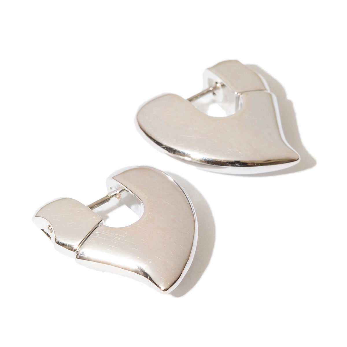 Plump heart pierced earrings