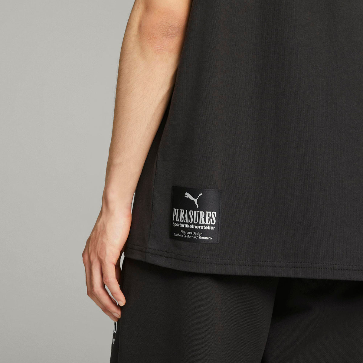 PUMA X PLEASURES GRAPHIC TEE