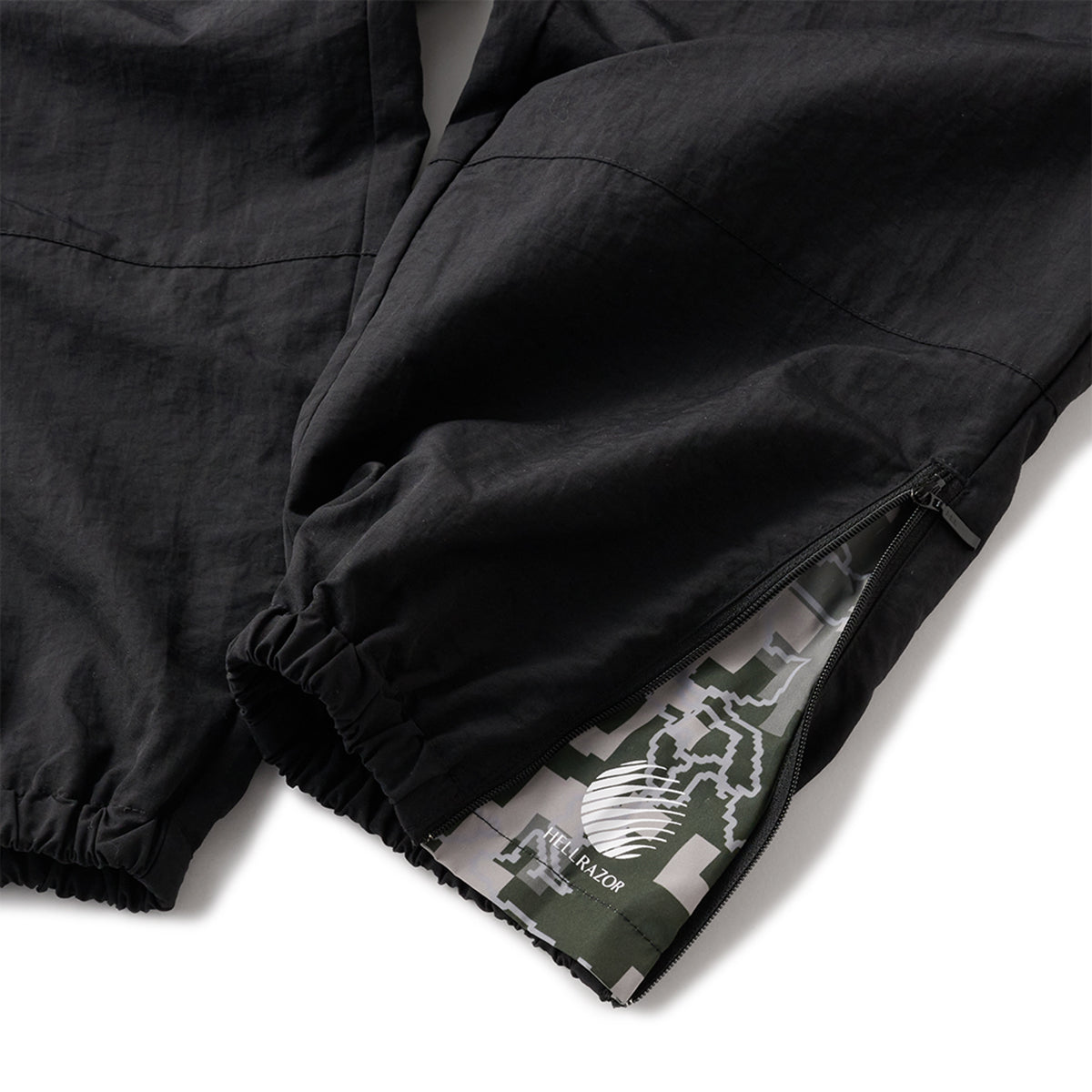HELLRAZOR x UMBRO NEW WORLD DIGITAL CAMO NYLON PANTS