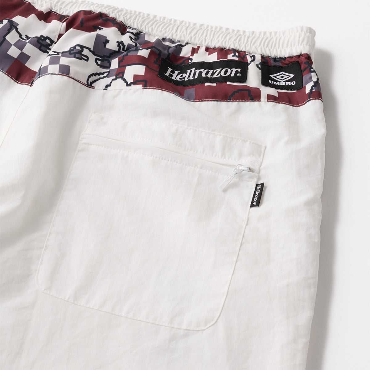 HELLRAZOR x UMBRO NEW WORLD DIGITAL CAMO NYLON PANTS