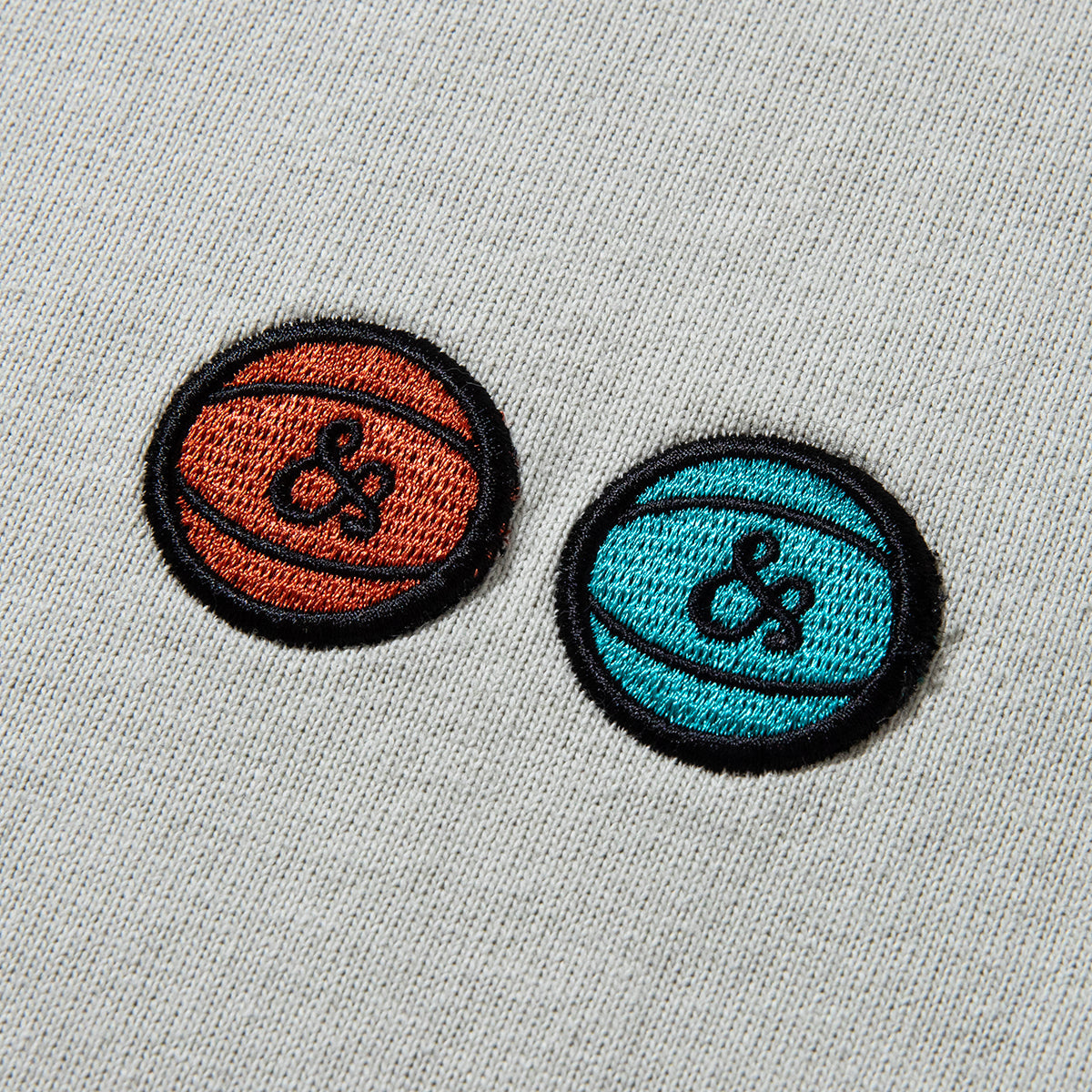 &RSON VACATION RINGER T-SHIRT アンダーソン バケーション リンガーTシャツ 2505-AND-CTS0008【メンズ レディース 半袖 バッグプリント ユニセックス 25SS】