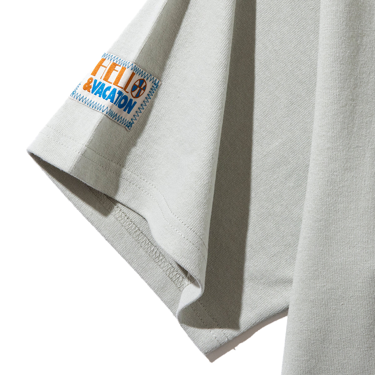 &RSON VACATION RINGER T-SHIRT アンダーソン バケーション リンガーTシャツ 2505-AND-CTS0008【メンズ レディース 半袖 バッグプリント ユニセックス 25SS】