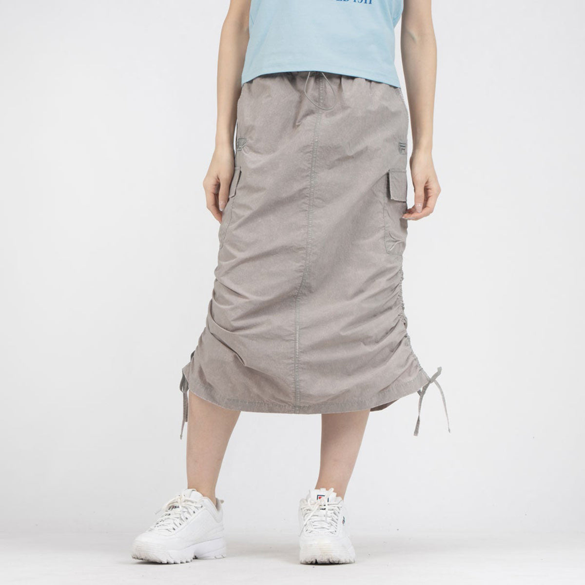 FILA CARGO SKIRT フィラ カーゴスカート CE6SCW007【レディース 製品染め サイドポケット ドローコード 26SS】