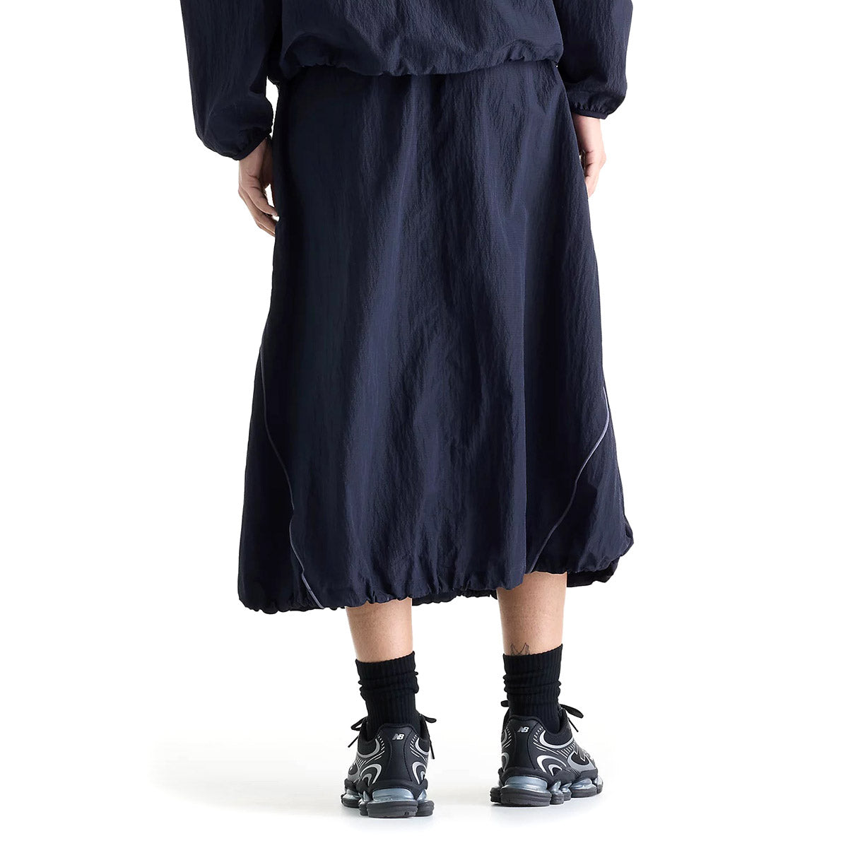 New Balance Sport Legacy Skirt ニューバランス Sport レガシースカート WB61D2OP【レディース ナイロンスカート 軽量素材 ウーブン素材 ドロップインポケット 26FW】