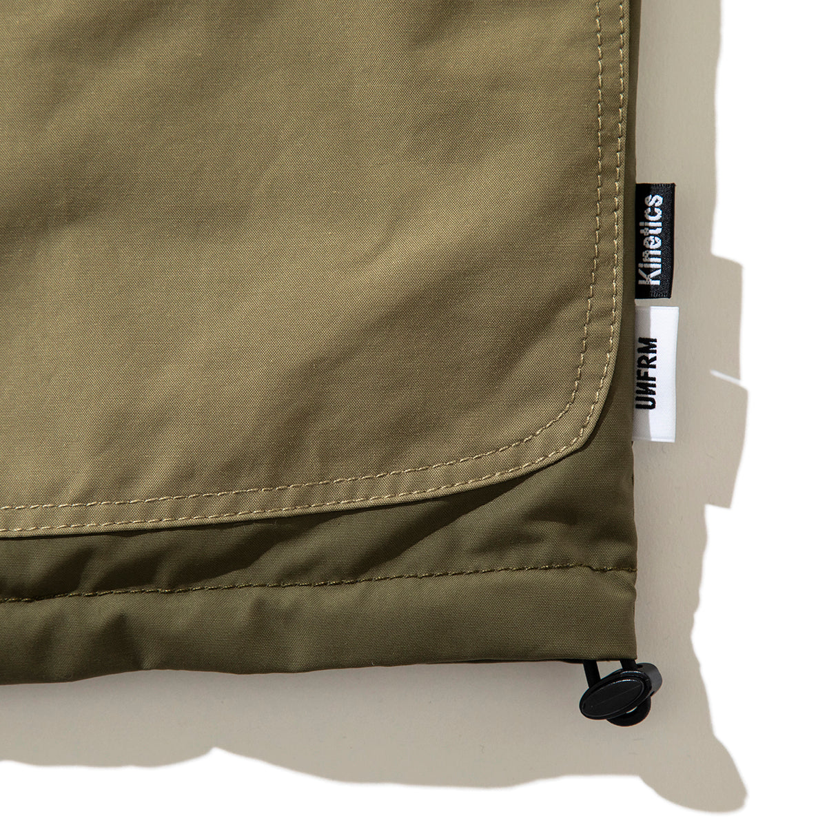 UNFRM x Kinetics REVERSIBLE STAND COLLAR VEST