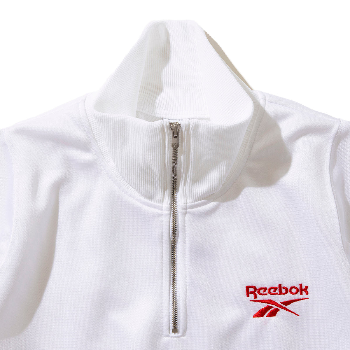 Reebok half zip deformed sweat shirt