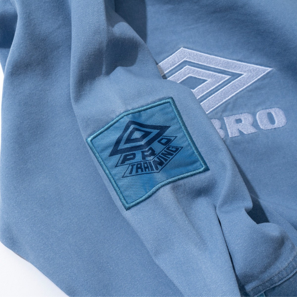 ICONIC DRILL TOP