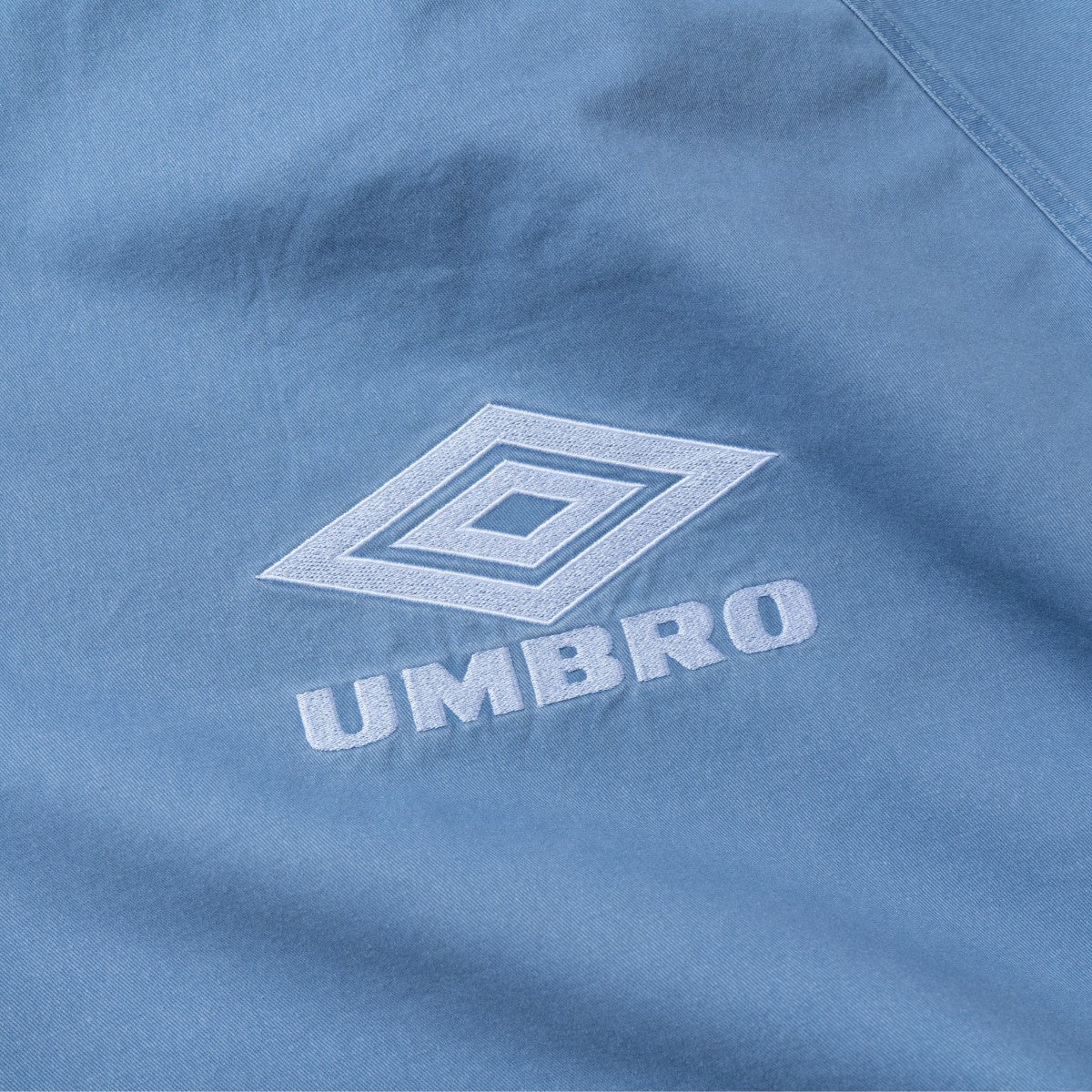 ICONIC DRILL TOP