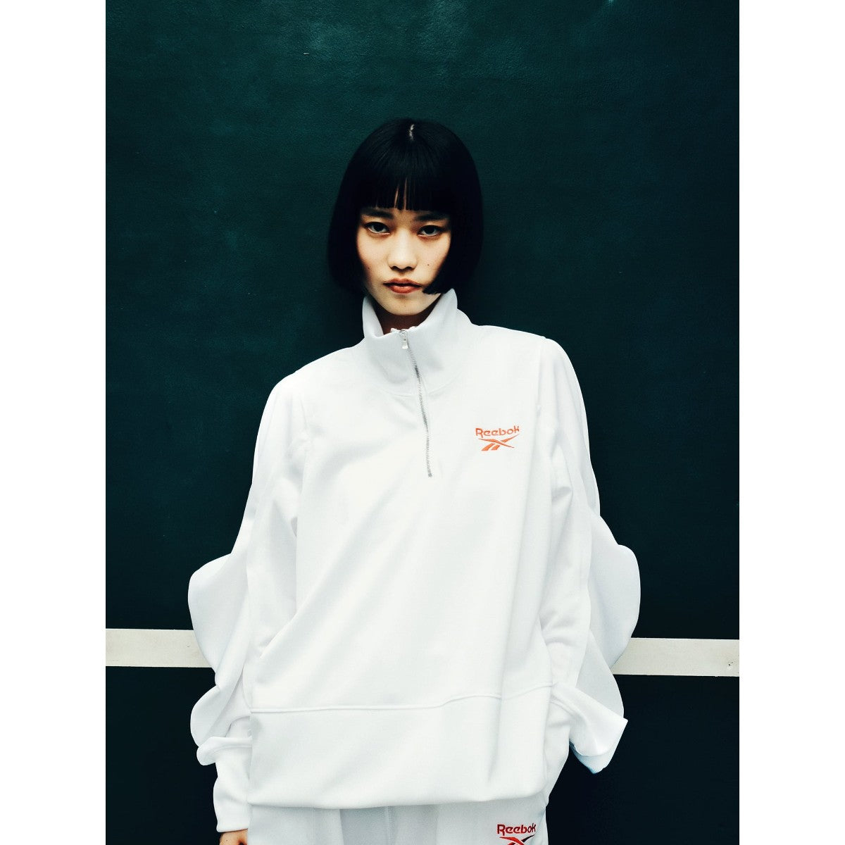 Reebok half zip deformed sweat shirt