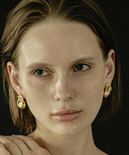 Oyster pierced earrings