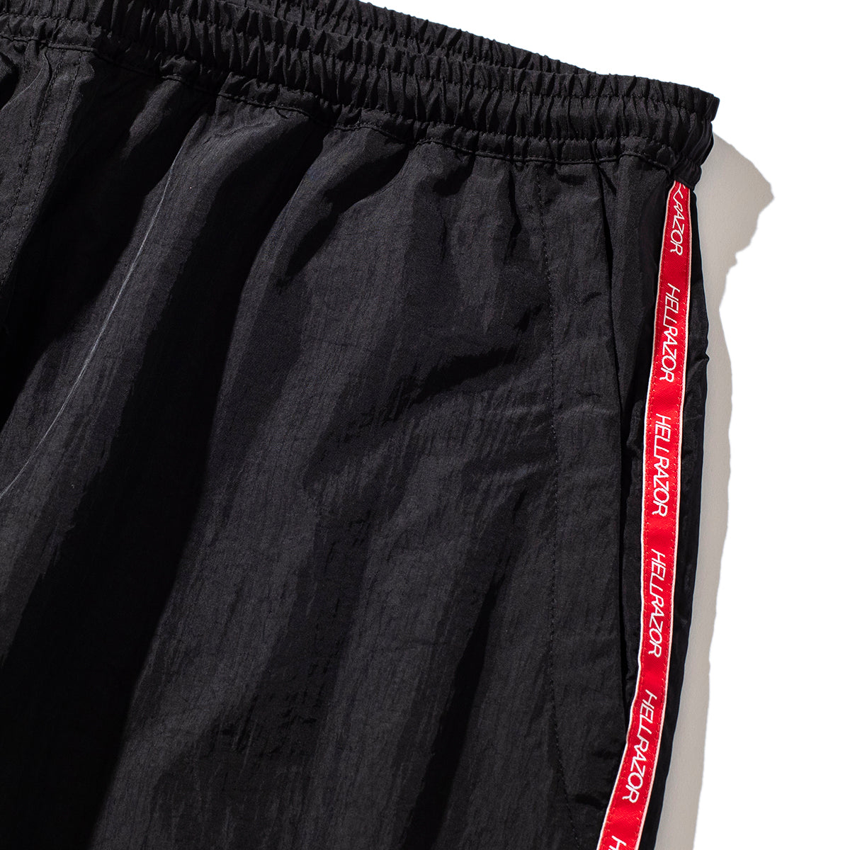 FILA × Hellrazor TRADEMARK LOGO  NYLON PANTS