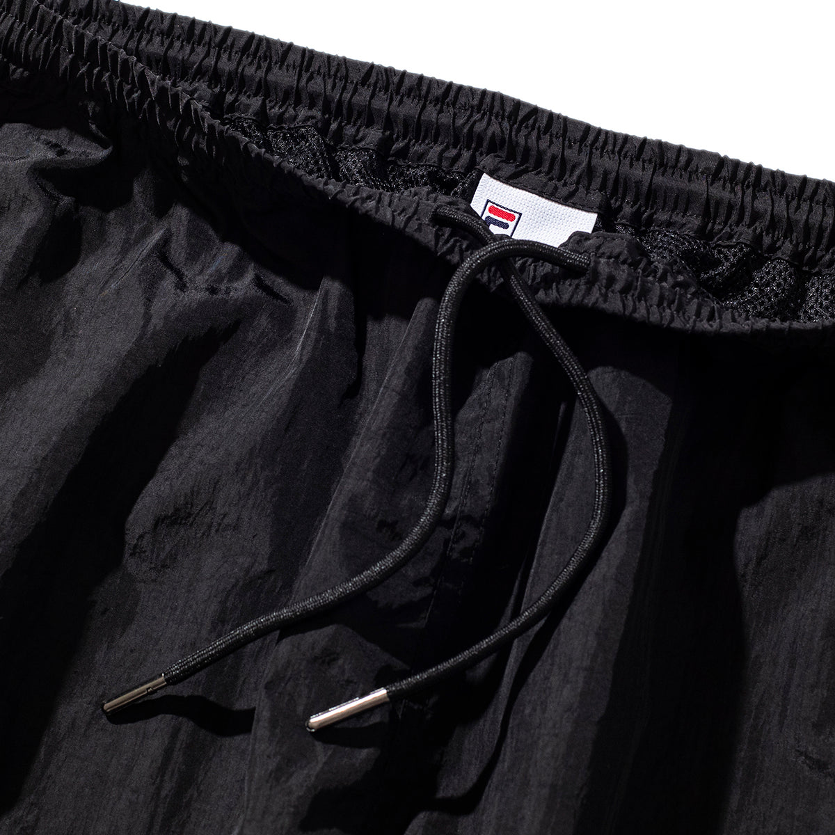 FILA × Hellrazor TRADEMARK LOGO  NYLON PANTS