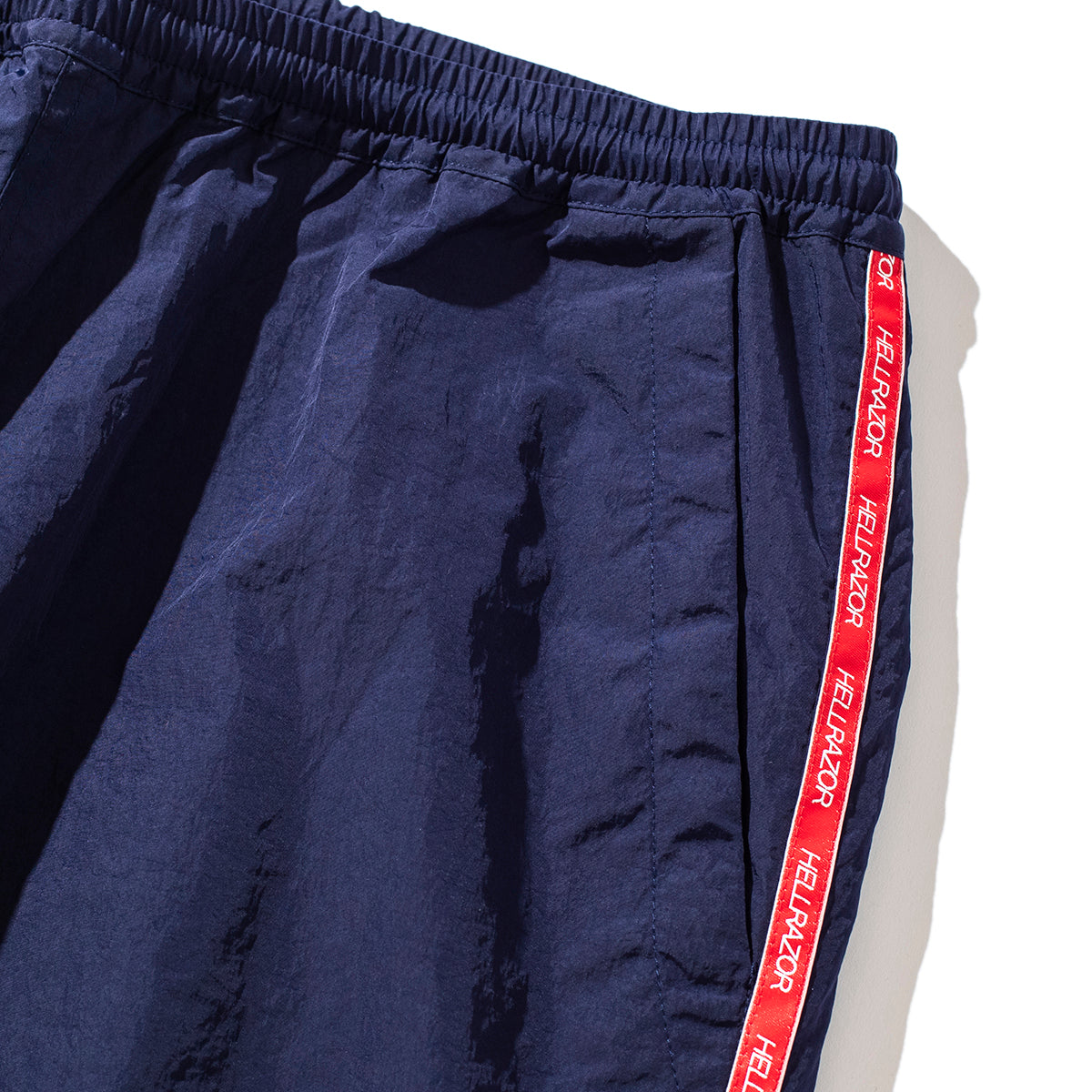 FILA × Hellrazor TRADEMARK LOGO  NYLON PANTS