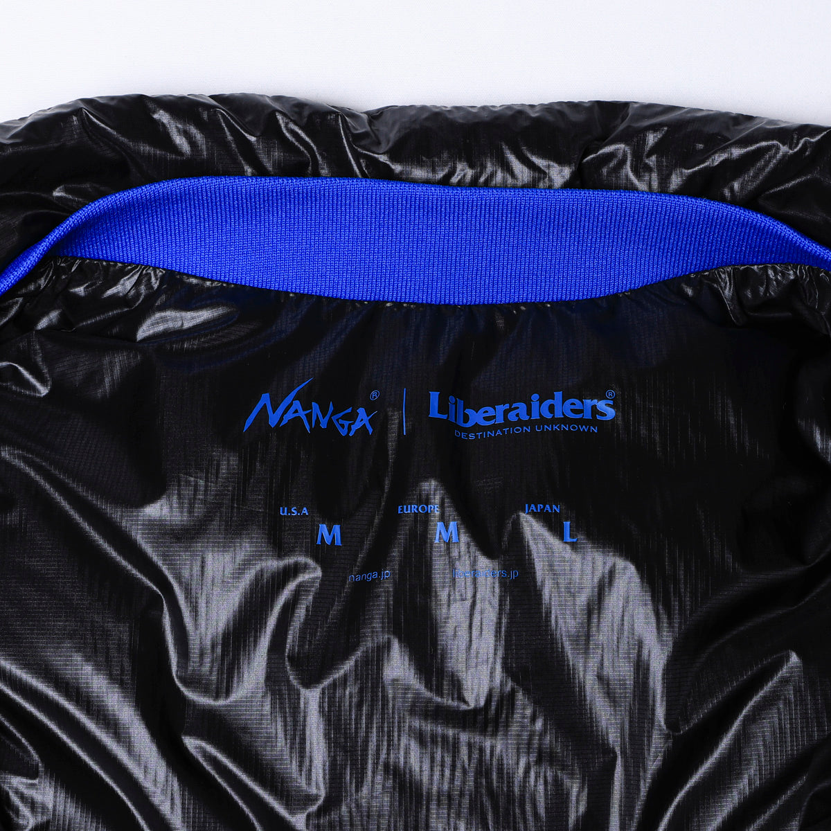 NANGA X LIBERAIDERS RIPSTOP NYLON DOWN JACKET