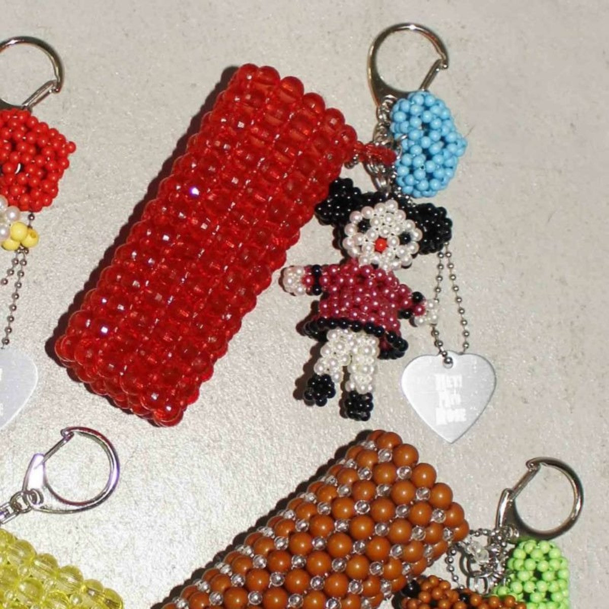 HEY! Mrs ROSE Beads Lip Keycharm ヘイ！ミセスローズ ビーズ リップ キーチャーム 253-140102【レディース ビーズ チャーム ハンドメイド バッグアクセサリー リップケース 25FW】