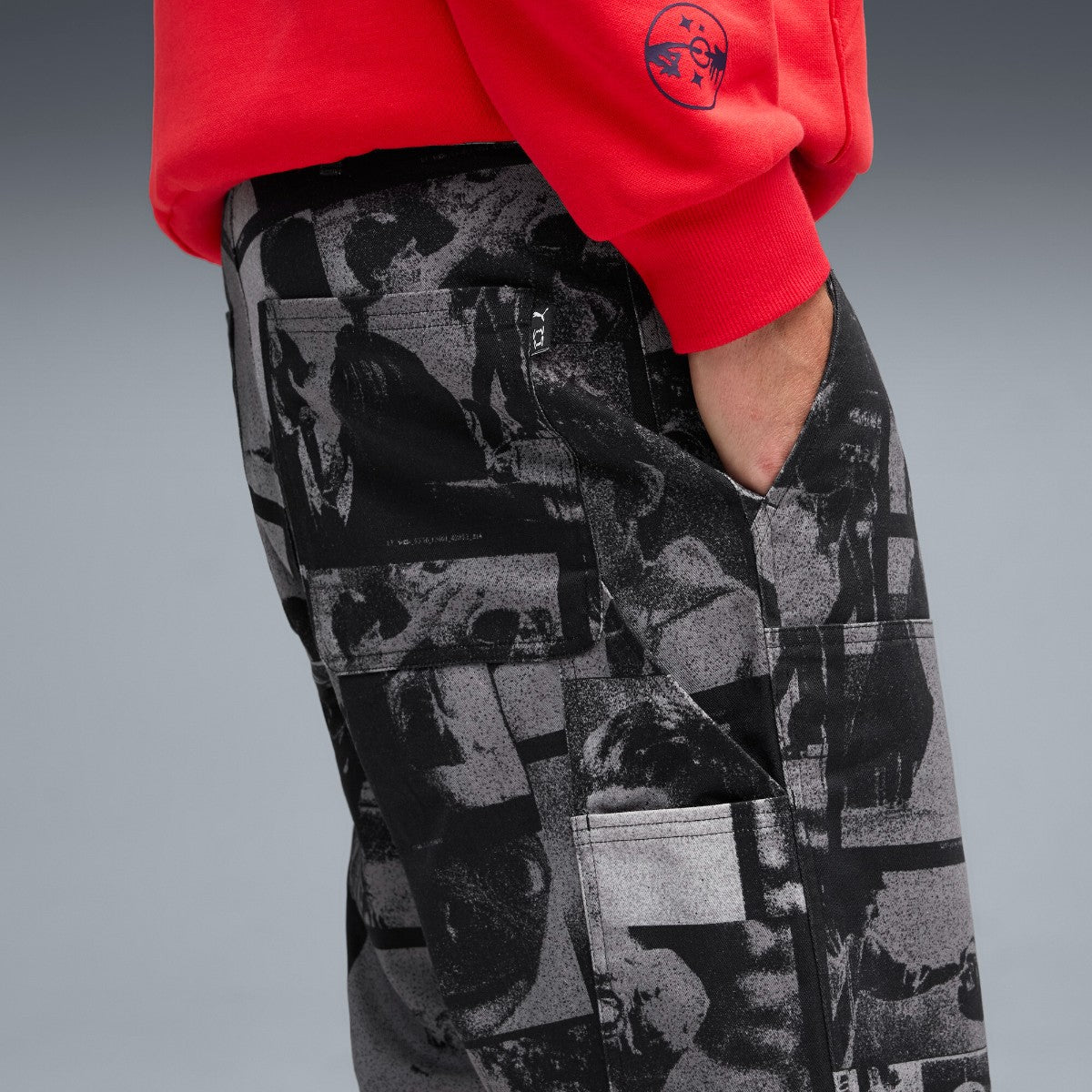 PUMA HOOPS x E.T. TWILL PANT プーマ HOOPS x E.T. ツイル パンツ 633102【メンズ パンツ ボトムス グラフィック 総柄 映画 コラボ 25FW】