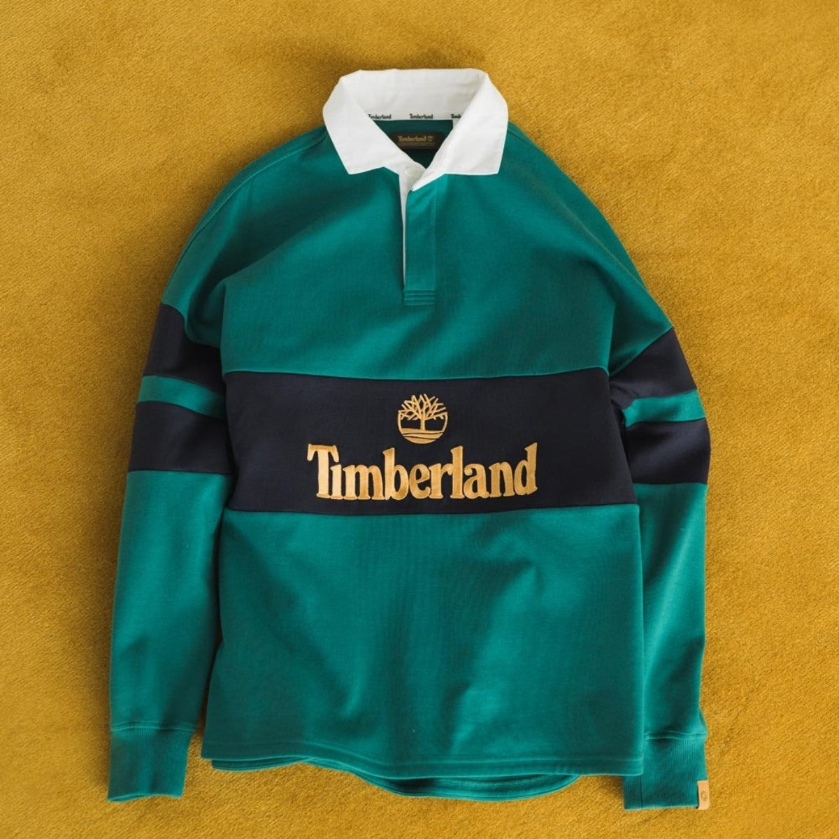 Timberland [TOKYO DESIGN COLLECTIVE] RUGBY SHIRTS ティンバーランド [トウキョウ デザイン コレクティブ]  ラグビー シャツ A5UTF【メンズ ロングTシャツ 長袖 刺繍 ブランドロゴ ユニセックス 25FW】
