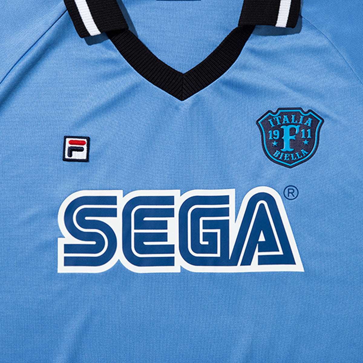 FILA FILA X SEGA FOOTBALL TEE フィラ フィラ セガ フットボール ティー CE6SAU701【メンズ コラボ 襟付き サッカーカルチャー 26SS】