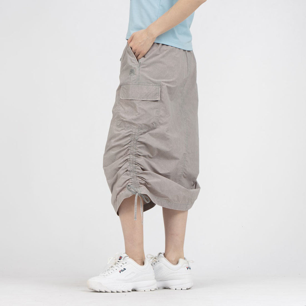 FILA CARGO SKIRT フィラ カーゴスカート CE6SCW007【レディース 製品染め サイドポケット ドローコード 26SS】