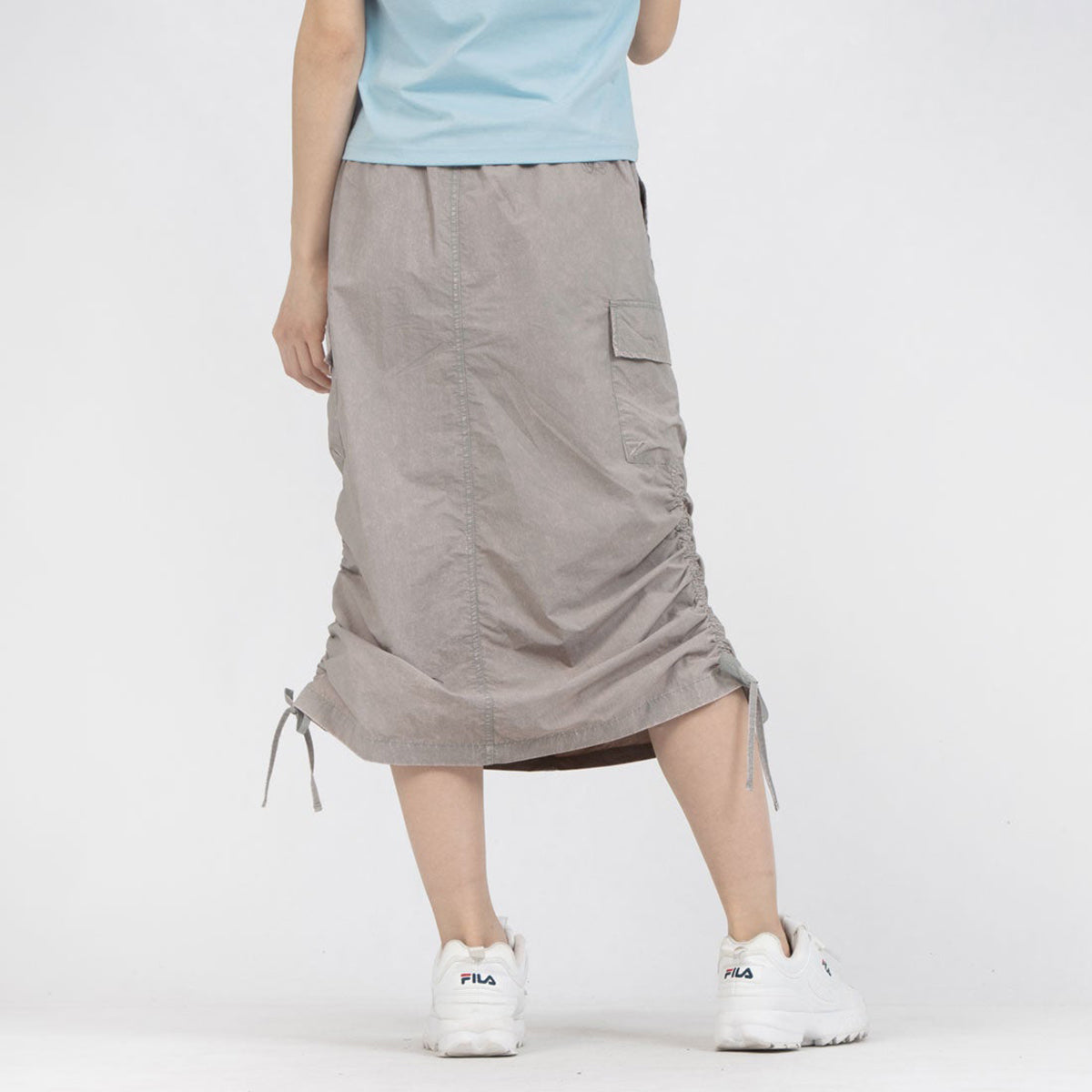 FILA CARGO SKIRT フィラ カーゴスカート CE6SCW007【レディース 製品染め サイドポケット ドローコード 26SS】