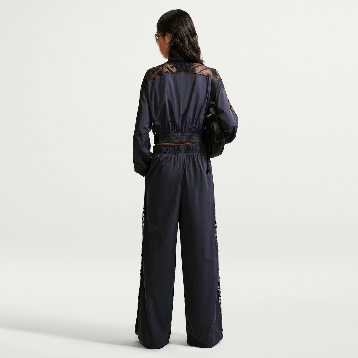 NIKE Loose Mid-Rise Lace Track Pants ナイキ ルーズ ミッドライズ レース トラックパンツ IU1984【レディース スポーツウェア トラックパンツ ナイロンパンツ ドローコード付き 26FW】