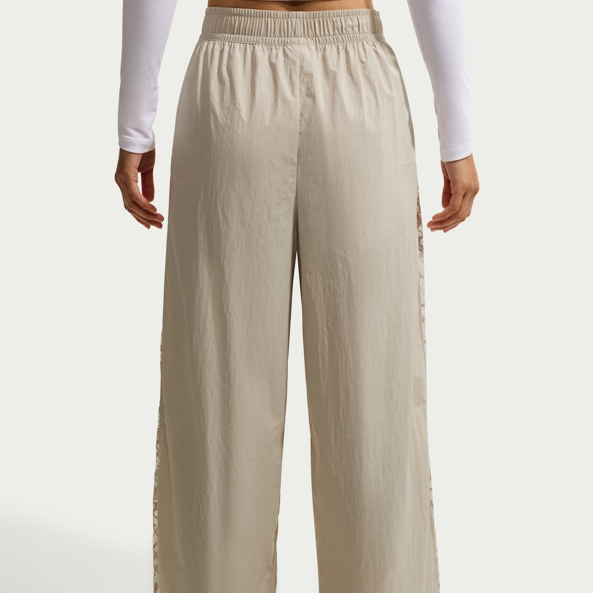 NIKE Loose Mid-Rise Lace Track Pants ナイキ ルーズ ミッドライズ レース トラックパンツ IU1984【レディース スポーツウェア トラックパンツ ナイロンパンツ ドローコード付き 26FW】