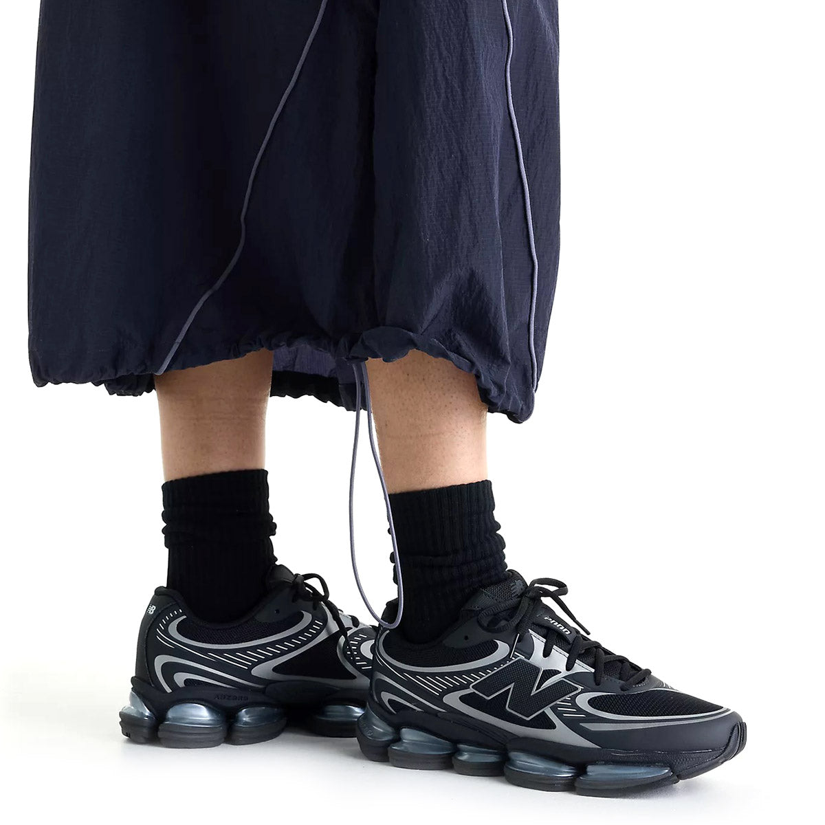 New Balance Sport Legacy Skirt ニューバランス Sport レガシースカート WB61D2OP【レディース ナイロンスカート 軽量素材 ウーブン素材 ドロップインポケット 26FW】