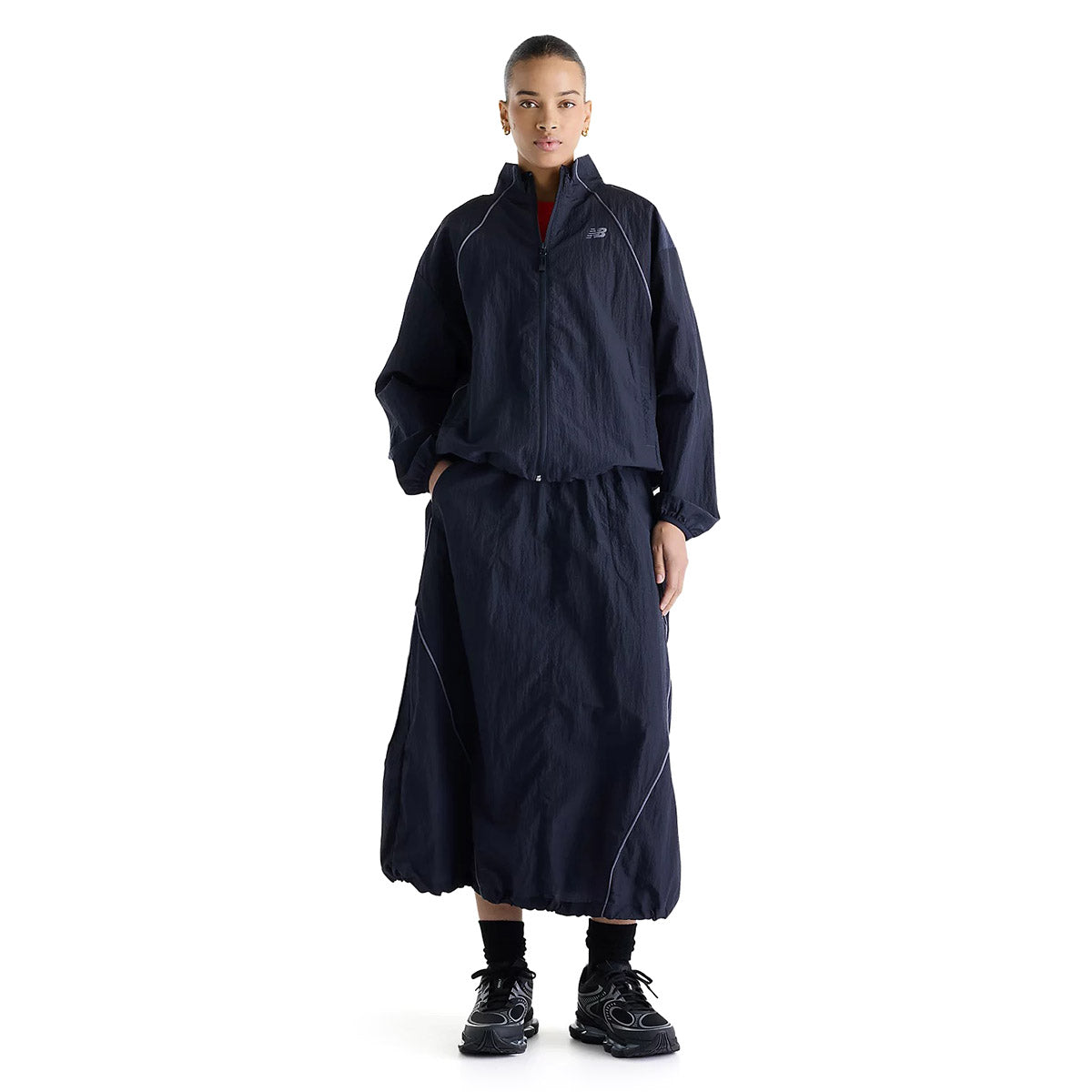 New Balance Sport Legacy Skirt ニューバランス Sport レガシースカート WB61D2OP【レディース ナイロンスカート 軽量素材 ウーブン素材 ドロップインポケット 26FW】