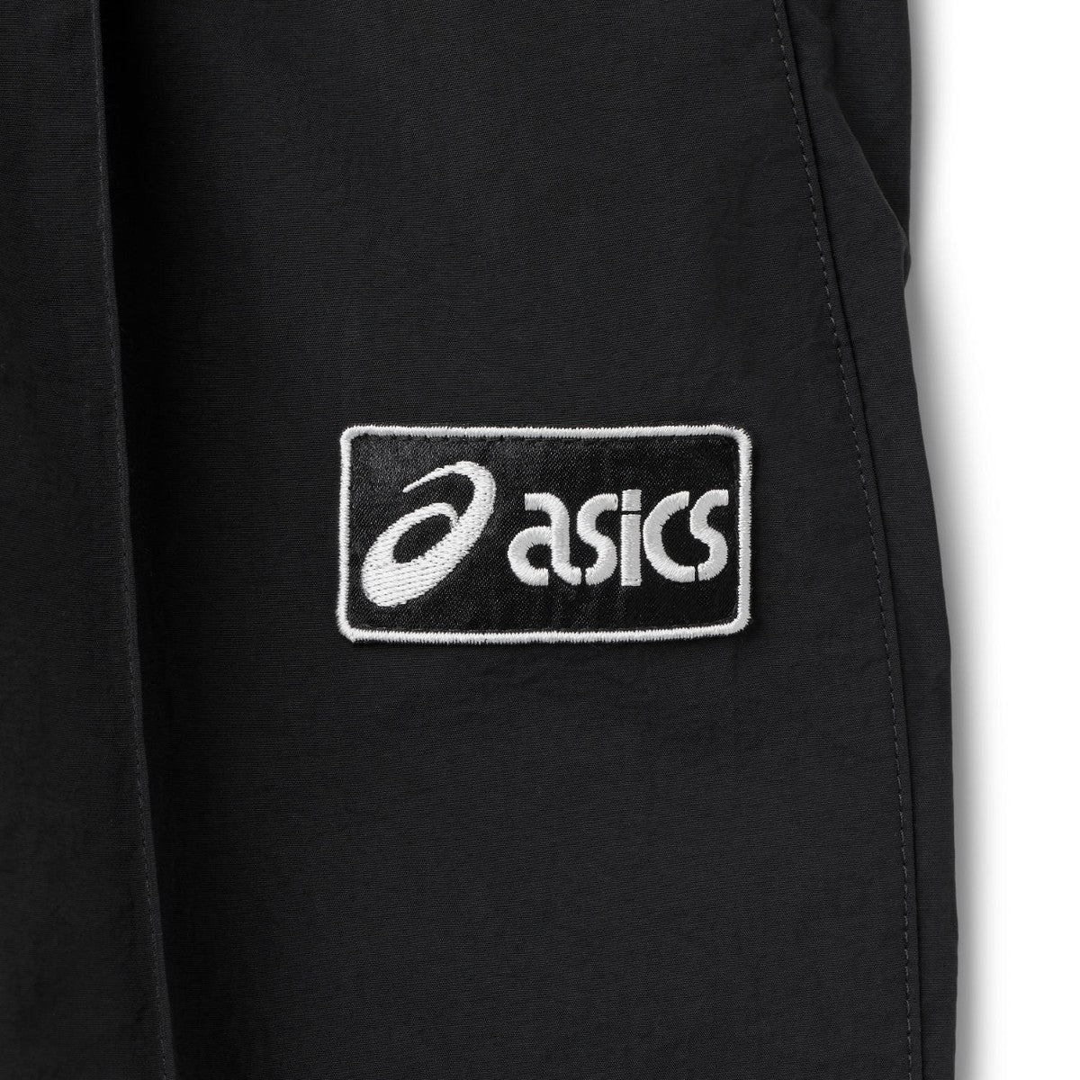 ASICS CLASSIC WOVEN TRACK PANT アシックス クラシック ウーブン トラックパンツ 2203A394【メンズ ナイロントラックパンツ ルーズフィット はっ水加工 ドローコード 26FW】