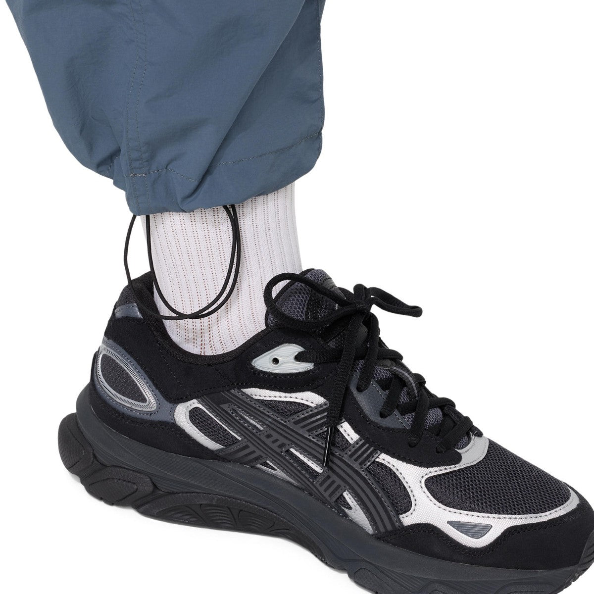 ASICS CLASSIC WOVEN TRACK PANT アシックス クラシック ウーブン トラックパンツ 2203A394【メンズ ナイロントラックパンツ ルーズフィット はっ水加工 ドローコード 26FW】