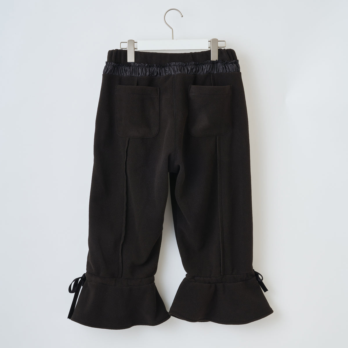 naokitomizuka Reebok Cropped Fleece Pants With Ribbon Hem ナオキトミヅカ リーボック クロップドフリースパンツ ウィズリボンヘム GRNTP016【レディース リボン フレア フリース ロゴ刺繍 ポケット付き 26FW】
