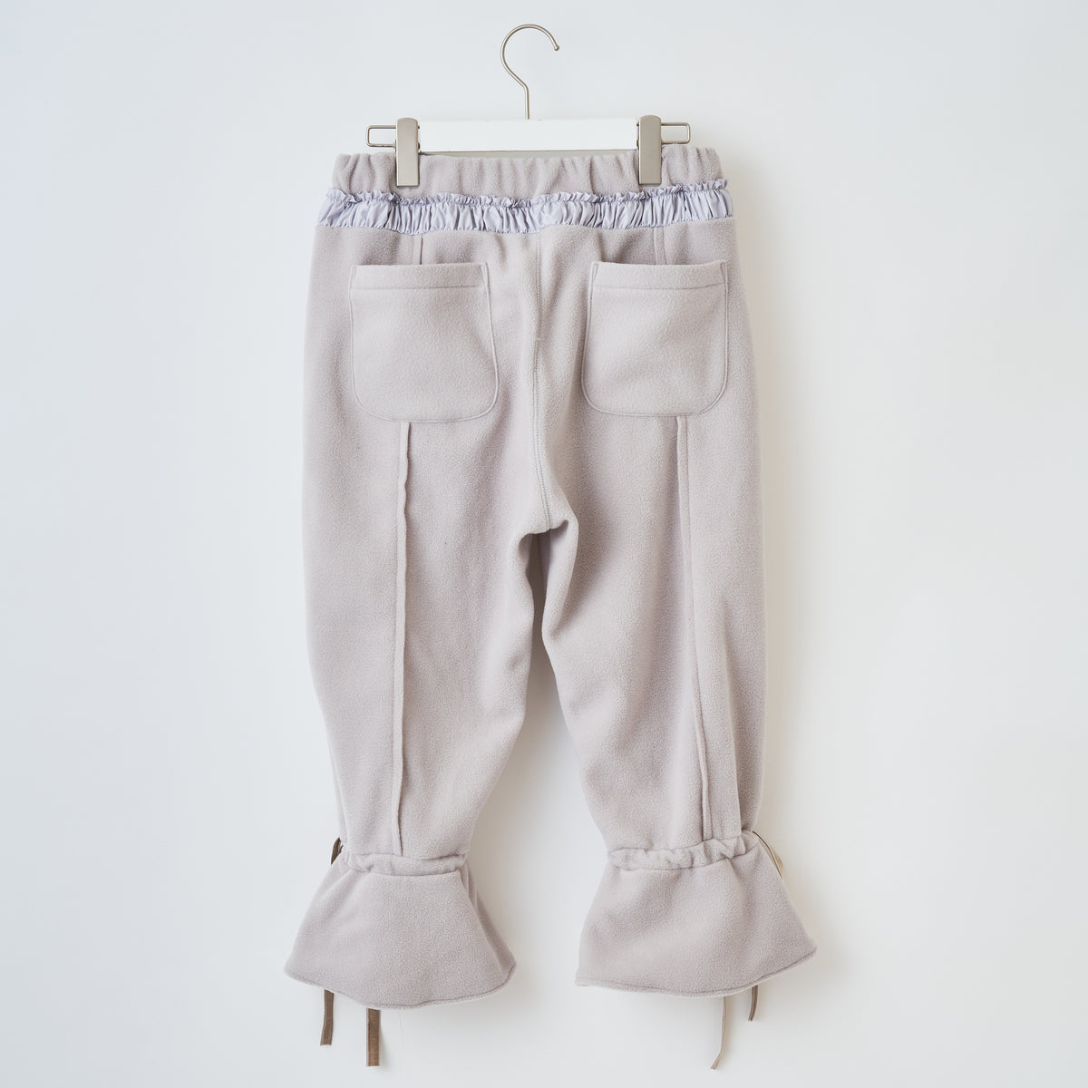 naokitomizuka Reebok Cropped Fleece Pants With Ribbon Hem ナオキトミヅカ リーボック クロップドフリースパンツ ウィズリボンヘム GRNTP016【レディース リボン フレア フリース ロゴ刺繍 ポケット付き 26FW】