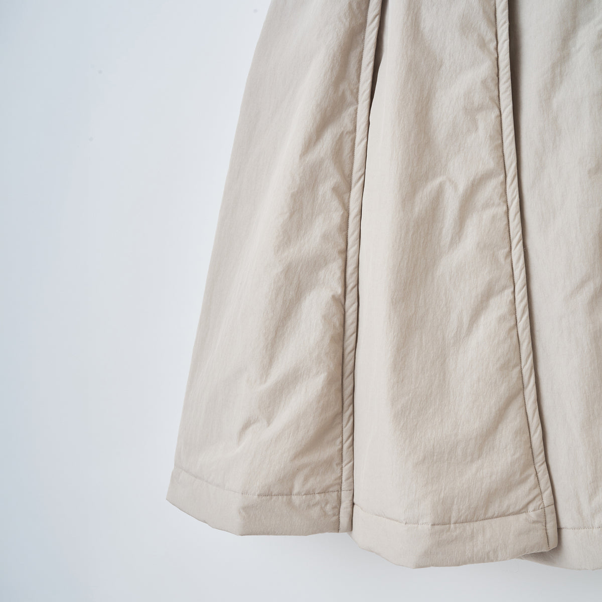 naokitomizuka Reebok Padded Pleated Skirt ナオキトミヅカ リーボック パデットプレーテッドスカート GRNTS015【レディース 中綿 プリーツスカート ロゴ刺繍 スポーティ  26FW】