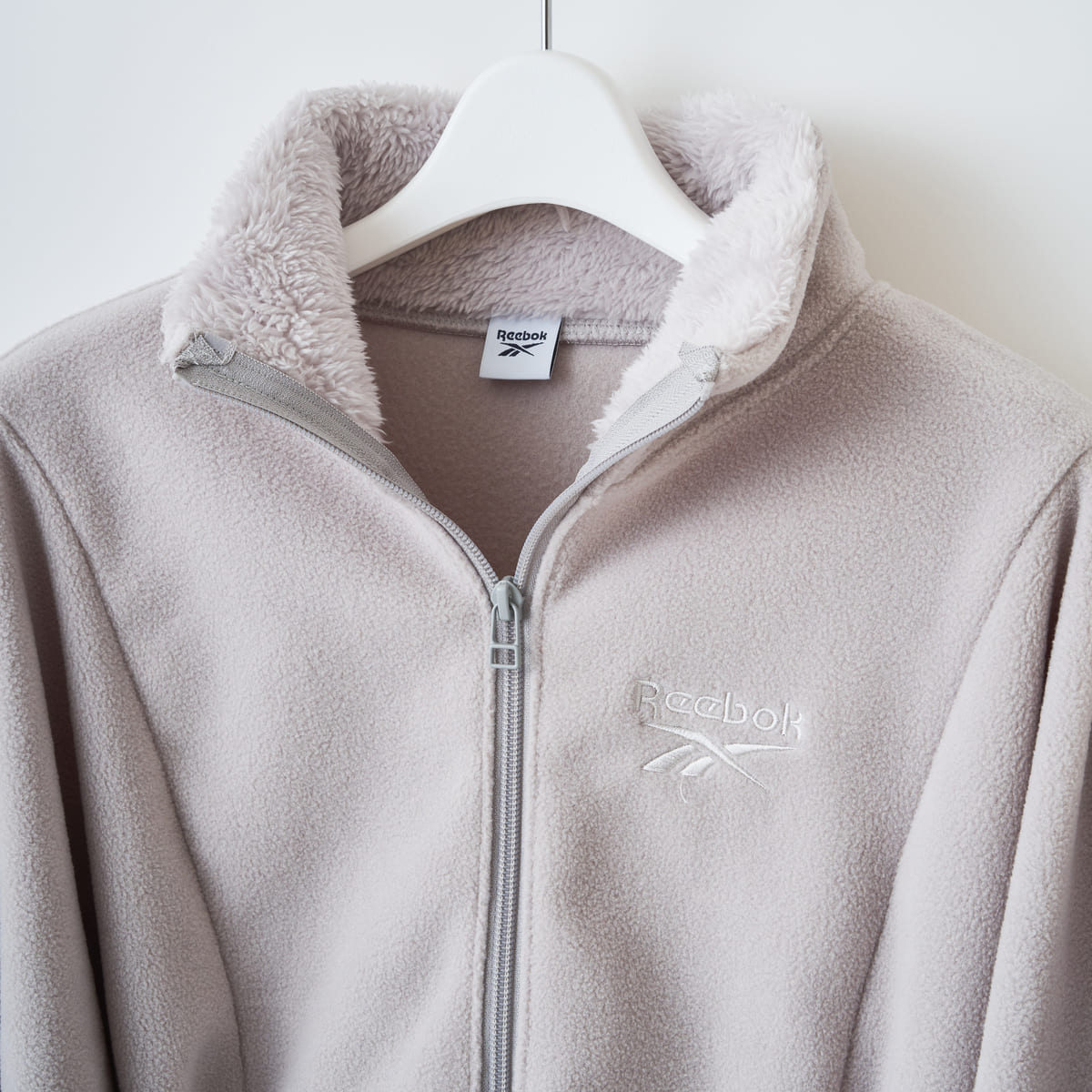 naokitomizuka Reebok Big Ribbon Fleece ナオキトミヅカ リーボック ビッグリボンフリース GRNTT028【レディース ジップジャケット リボン マフラー フリース ロゴ刺繍 26FW】